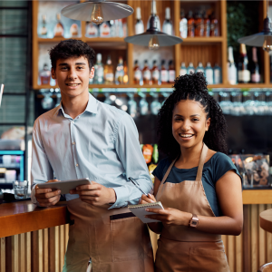 Waitress and waiter handling difficult customers with grace. 